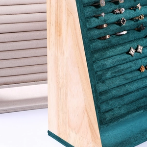 Dark green velvet and wood jewelry display tray for rings and earrings with multiple slots