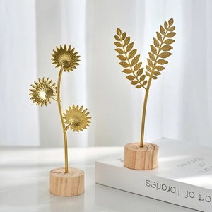 Nordic gold ginkgo leaf and sunflower metal ornaments with solid wood base for home decor