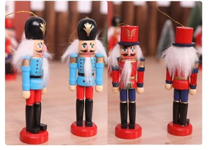 Detailed view of hand-painted wooden nutcracker soldier ornaments for Christmas trees