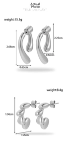 Detailed view of silver liquid metal earrings with specific dimensions and weight