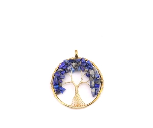 Detailed view of handmade golden wire-wrapped tree of life pendant with lapis lazuli stones