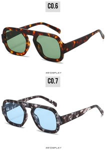 Detail view of retro square aviator sunglasses in tortoiseshell and marble patterns