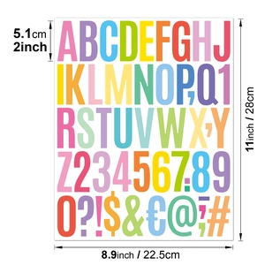 Macro detail of 2-inch colorful letter and number stickers with precise size measurements