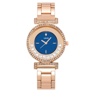 Fashionable rose gold women's watch with deep blue dial and sparkling crystal bezel