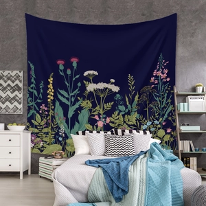Detailed view of bohemian floral tapestry as a bedroom wall hanging backdrop