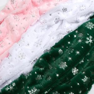 Plush sequin Christmas fabric with silver snowflakes in pink, white, and dark green