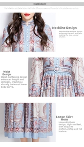 Detail view of the stand collar neckline, belted waist, and vintage floral print pattern