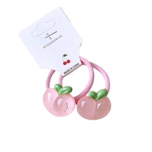 Pair of sweet pink elastic hair ties with cute translucent resin peach charms on white card