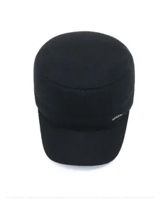 Top view of a thick black winter flat cap featuring a metal SPORT letter ornament