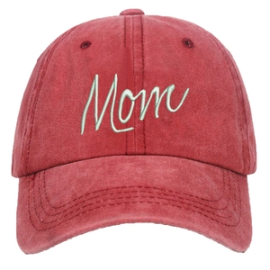 Detailed view of high-quality green Mom 3D embroidery on washed red cotton baseball cap