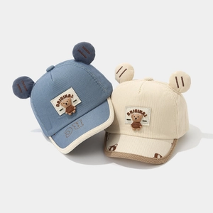 Corduroy baby baseball caps with 3D ears and cartoon bear patch in blue and beige