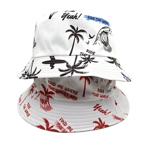 Reversible bucket hat with coconut tree prints for beach vacation sun protection