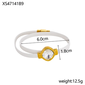 Double-layer white bracelet with square crystal and gold clasp on a clean background