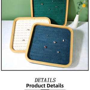 Bamboo jewelry trays with green velvet lining for rings and studs display setup