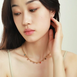 18k gold plated stainless steel necklace with colorful enamel bead pendants on model