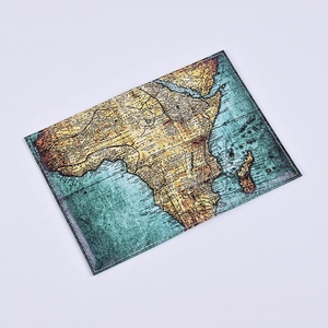 Detailed view of PU leather passport holder featuring a vintage printed Africa map design