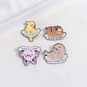 Cute cartoon enamel pins featuring bird, sloth, bat and seal on white canvas background