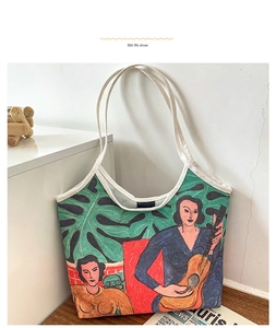 Detail of artistic canvas tote bag with vibrant oil painting illustration and thick straps