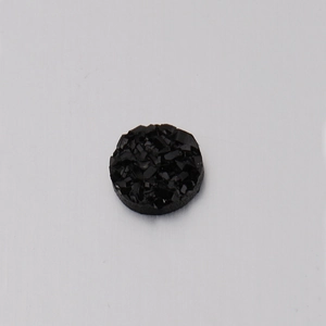 Detail showing a 6mm round black resin bead with sparkling druzy crystal texture