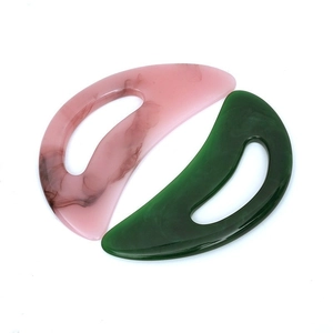 Pink and green resin gua sha board set with marble texture for full body massage