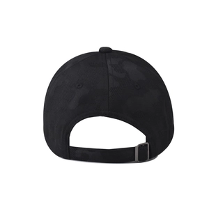 Close-up of the camouflage fabric texture and metal adjustable buckle on the black baseball cap