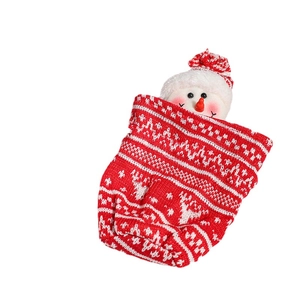 Knitted Christmas gift bag featuring a snowman design for holiday candies and small gifts