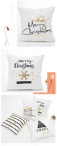 Detail of Christmas pillowcase with gold foil Merry Christmas text and festive patterns