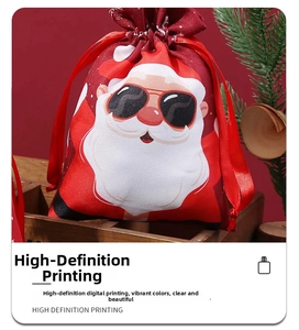 Close-up of a festive red drawstring gift bag with a stylish Santa Claus cartoon print