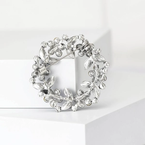 Silver rhinestone wreath brooch with leaf design and secure back pin mechanism