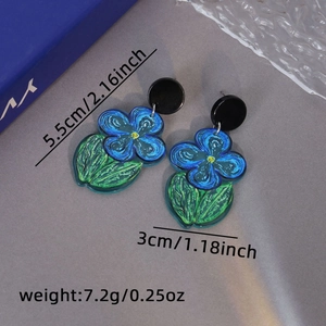 Detailed view of blue flower acrylic earrings with dimensions 5.5cm by 3cm and 7.2g weight