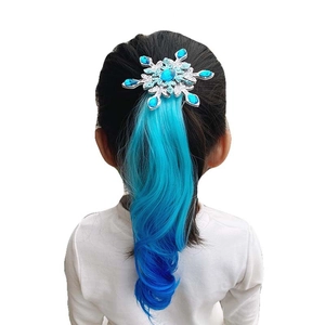 Detail of snowflake hair clip with gradient blue curly hair extension for girls