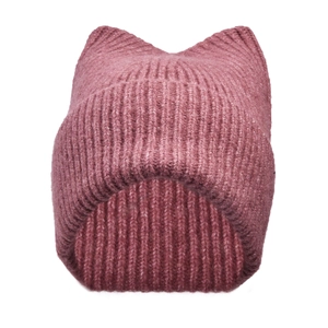 Detail of ribbed knit texture on a dusty pink beanie with cute cat ear design