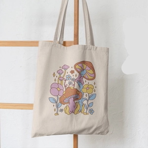 Beige canvas tote bag with butterfly mushroom floral print on wooden hanger