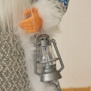 Poupée Père Noël debout en gris et bleu avec une lanterne pour décoration de Noël