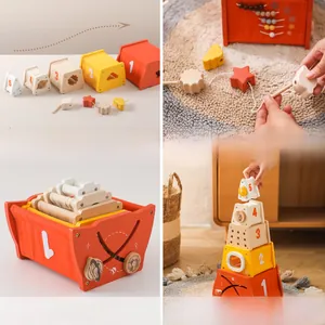 Detail of Montessori rocket stacking toy with nesting boxes and threading blocks