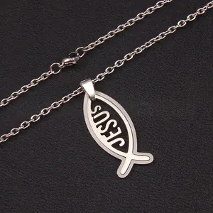 Polished silver stainless steel Jesus fish pendant necklace with cross chain on black surface