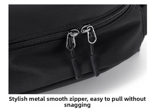Macro shot of smooth dual zippers on a durable black nylon backpack with corded pulls