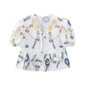 Women's white floral linen blouse with daisy print, V-neck tie-front and puff sleeves