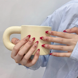 Handmade cherry french almond press-on nails with red tips and hand-painted fruit art