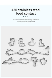 Flat lay macro of 430 stainless steel dinosaur and palm tree cookie cutters set
