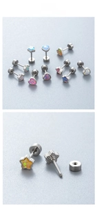 Detail of star-shaped opal ear studs with flat back screw threading in titanium steel
