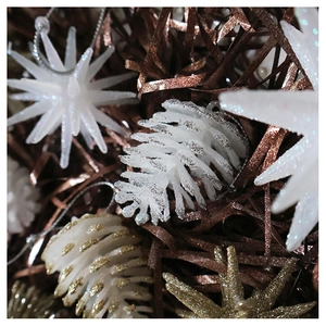Close-up of champagne glitter pine cones and star ornaments for Christmas tree decoration