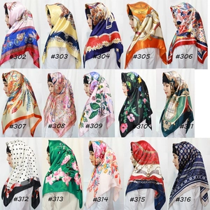 Collage of fifteen varied floral and geometric print satin square silk headscarves