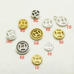 Assorted silver and gold ancient coin charms and barrel beads for DIY jewelry making