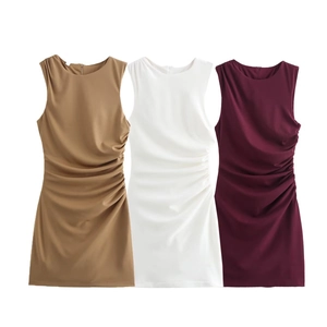 Three stylish sleeveless pleated knit dresses in khaki, white and burgundy colors