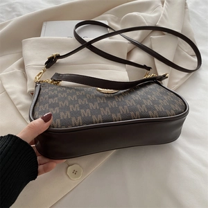 Vintage French underarm bag with monogram print and golden chain strap in dark brown