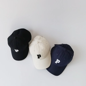 Three children's baseball caps in black, cream, and navy blue with P letter embroidery