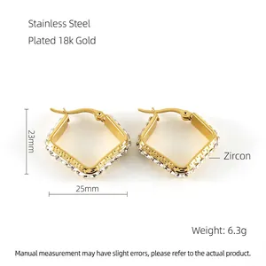 Detail of 18K gold plated square hoop earrings featuring zircon inlay and side engraving