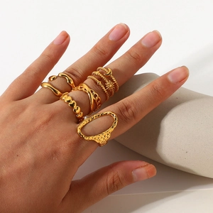 18K gold plated stainless steel stacking rings featuring celestial and chain motifs