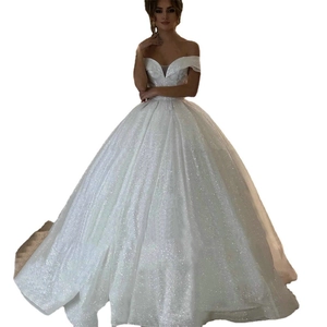 Sparkly white off-shoulder bridal gown with sequins and dreamy cathedral train